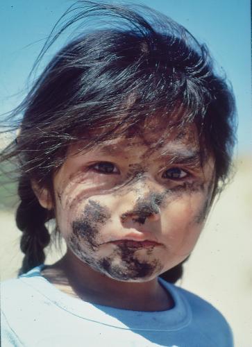 Phyllis Coochyamptewa with fungus smeared on face, circa 1980