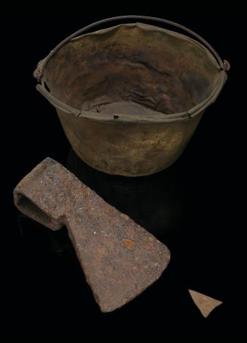 Dutch brass kettle, ax head and arrow point, circa 1600 to 1670.