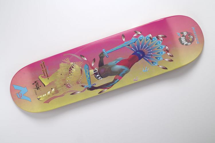 Pink and yellow “Apache Mountain Spirit Dancer” skateboard designed by Joe Yazzie
