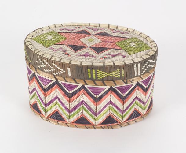 A colorful basket with intricate patterns.