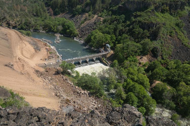 Dam infrastructure in a river valley landscape