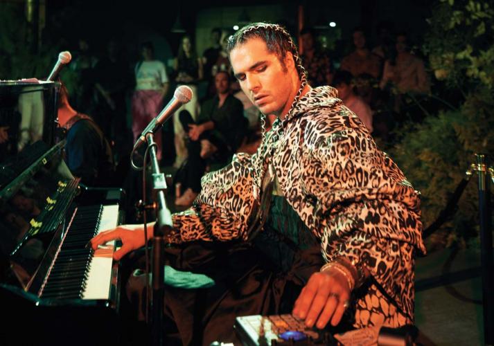 Jeremy Dutcher performs at a piano.