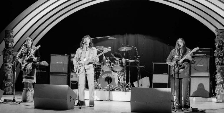 Members of the band Redbone perform on stage during the 1970s.