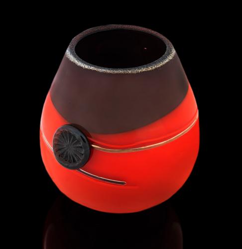 A red and black glass sculpture