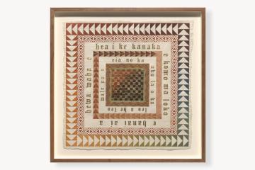 Framed art made of cloth pigmented in reddish tones and gold leaf.